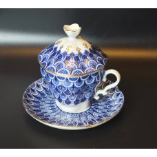 Cup and saucer with lid 