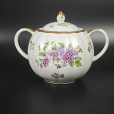 Wear to gilt on finial and handles - see photo.