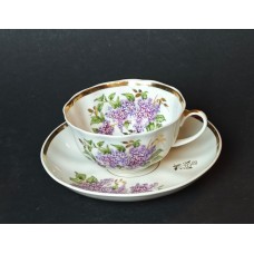 Minimal gilding wear, with black spots and dents.