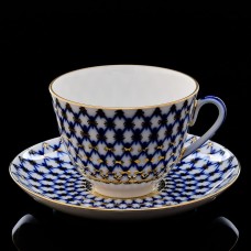 This cobalt net porcelain cup and saucer will complement any meal - whether it is an ordinary tea party with friends or a holiday feast. The set was m
